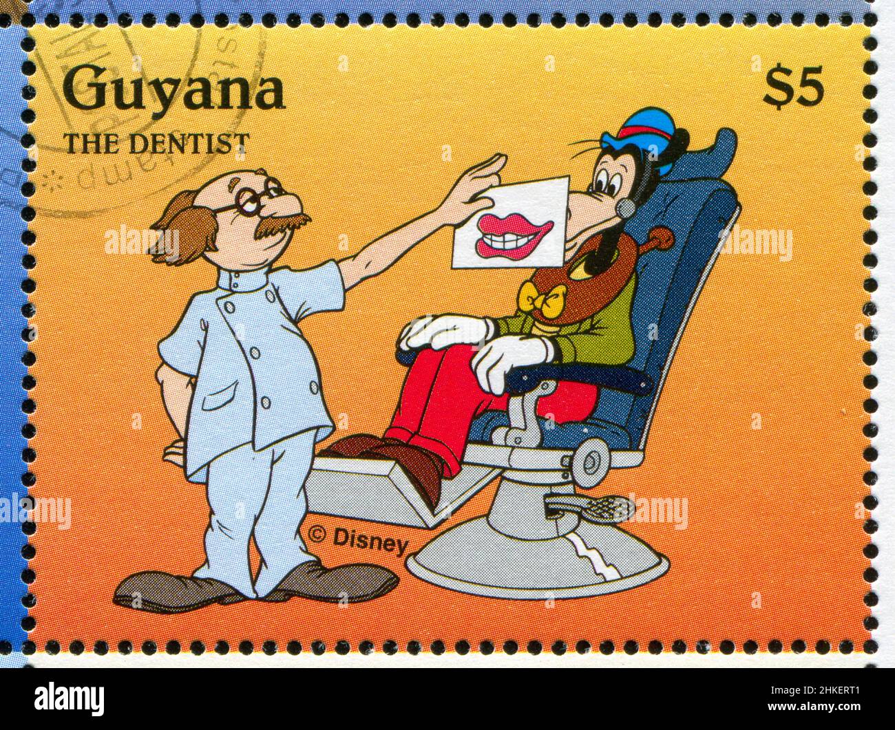 GUYANA - UM 1995: Briefmarke gedruckt von Guyana, zeigt Walt Disney Figuren, Goofy, um 1995 Stockfoto