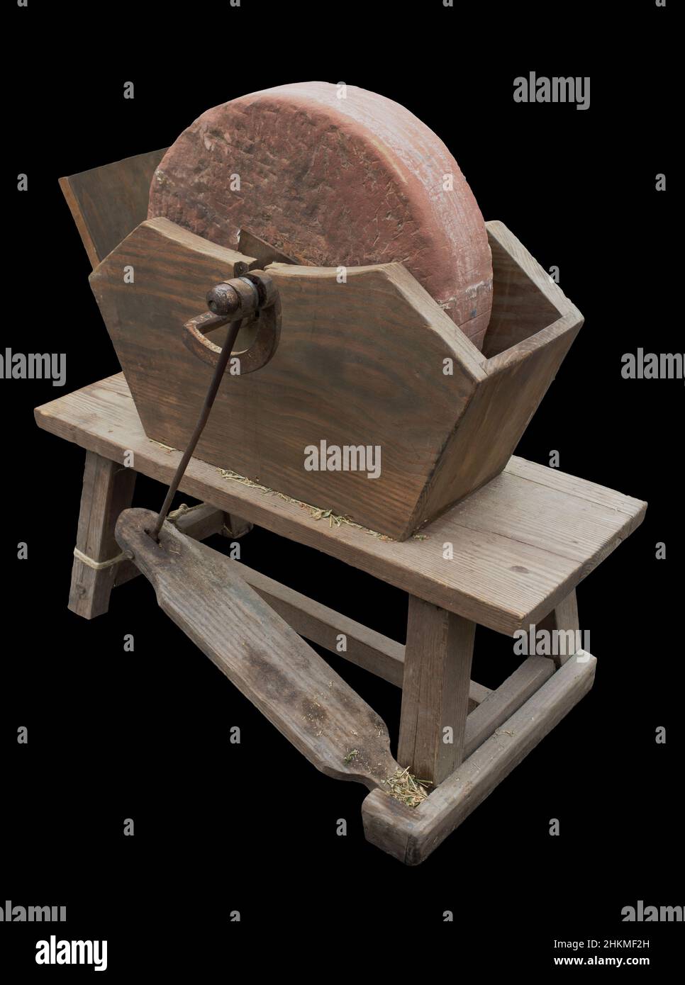 Antike, pedalbetriebene Schärfmaschine. Isoliert auf schwarzem Hintergrund Stockfoto