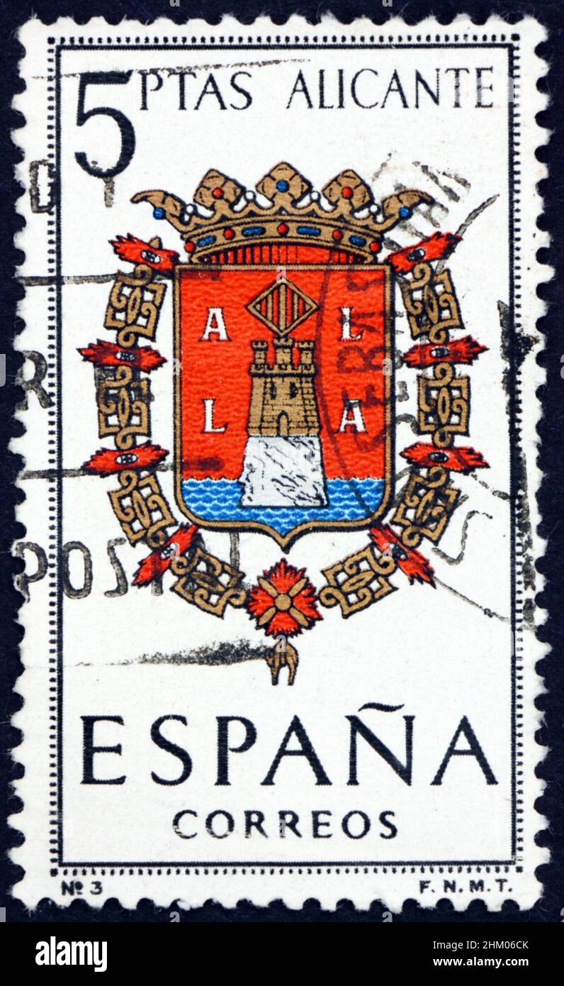 SPANIEN - UM 1962: Eine in Spanien gedruckte Briefmarke zeigt Arms of Alicante, Provincial Arms, um 1962 Stockfoto