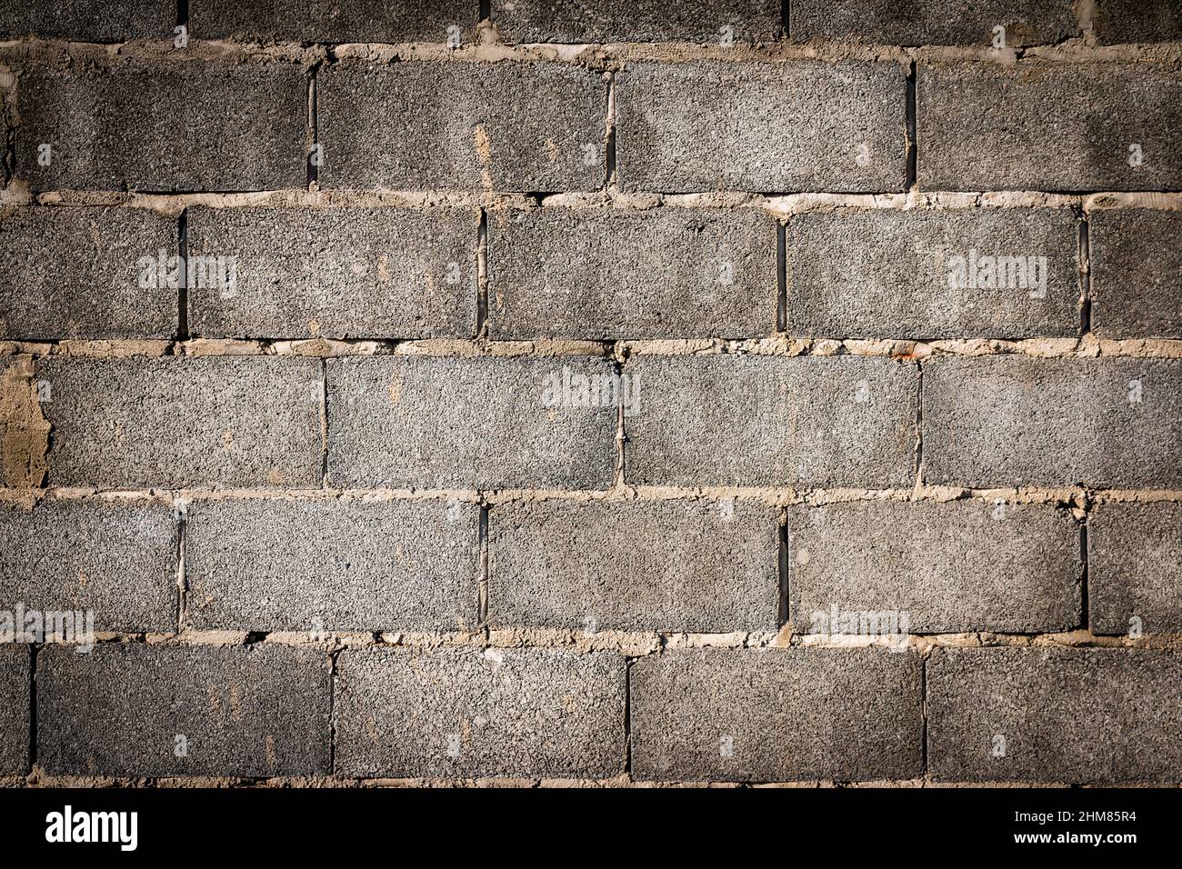 Alte graue Betonbausteine Hintergrund Stockfoto