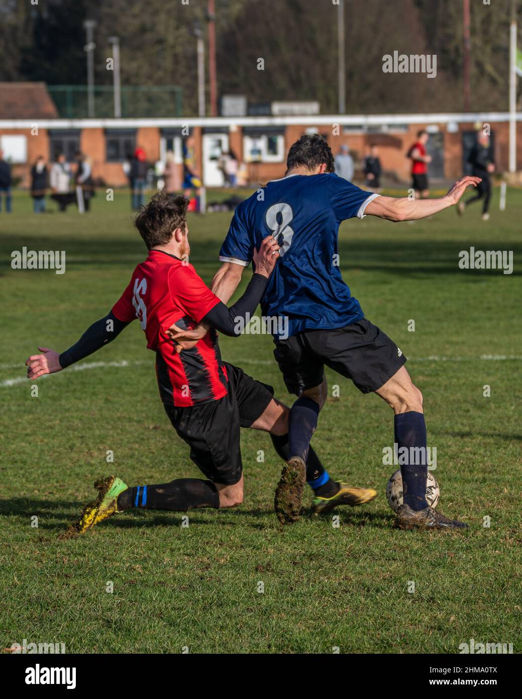 Fußball-Tackle Stockfoto