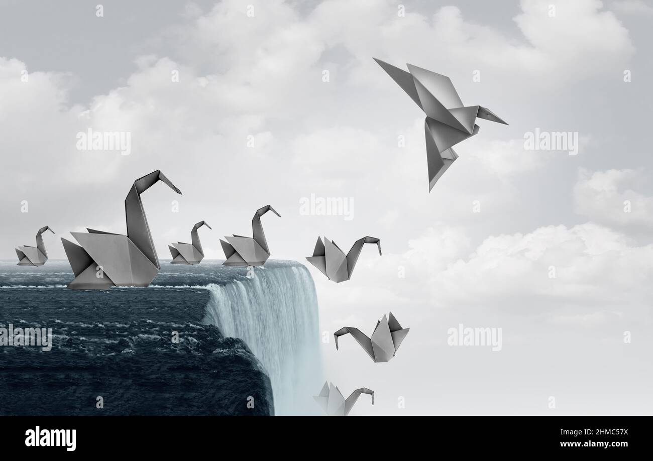 Adapt to Survive Konzept als Papier Schwäne fallen von einem Wasserfall und ein Origami-Vogel Anpassung neuer Fähigkeiten und fliegen weg in Sicherheit. Stockfoto