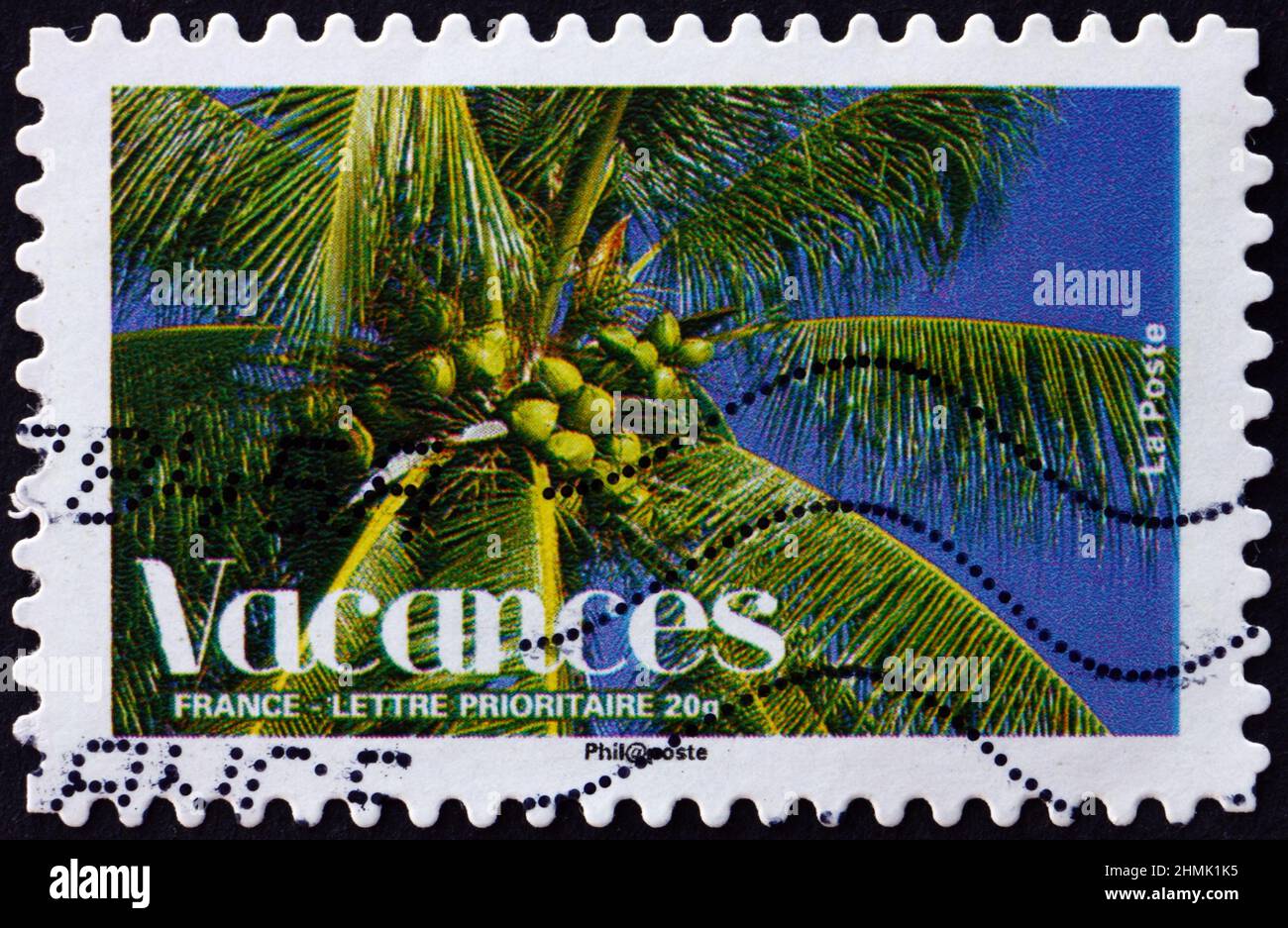 FRANKREICH - UM 2008: Eine in Frankreich gedruckte Marke zeigt Palmen, Feiertage, um 2008 Stockfoto
