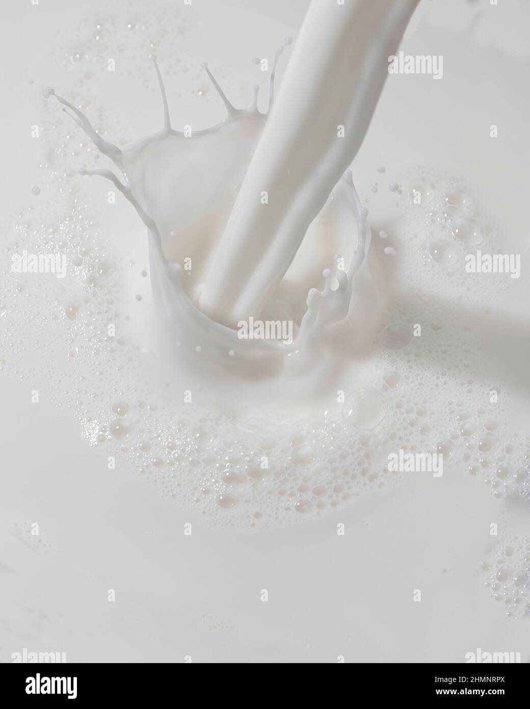Milch Spritzen Stockfoto
