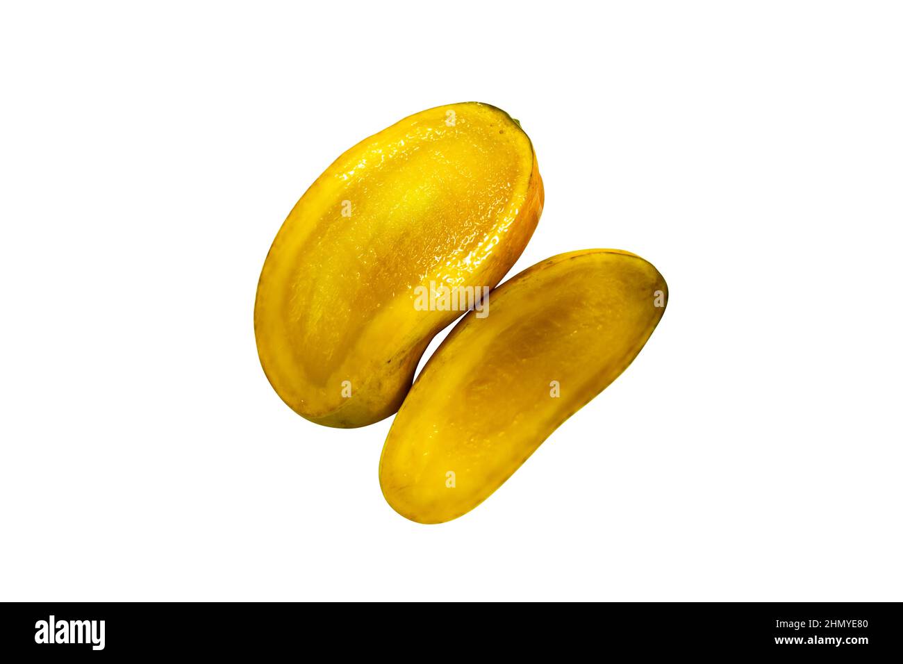 Unreife Mangos fühlen sich steinhart an. Eine reife Mango wird weich, prall und nur ein wenig geben Stockfoto