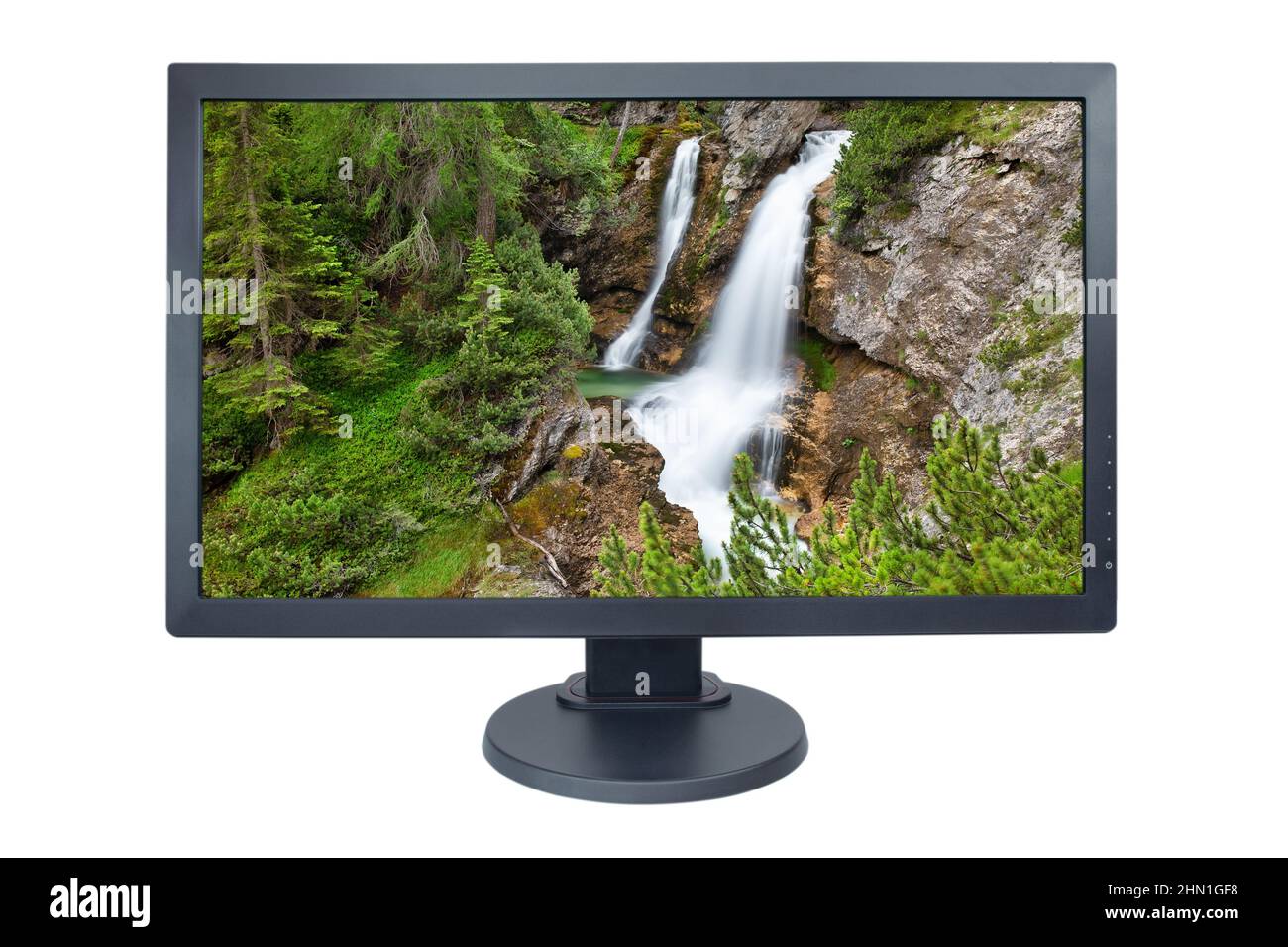 Computermonitor auf Weiß isoliert, während Bildschirmschoner ausgeführt wird Stockfoto