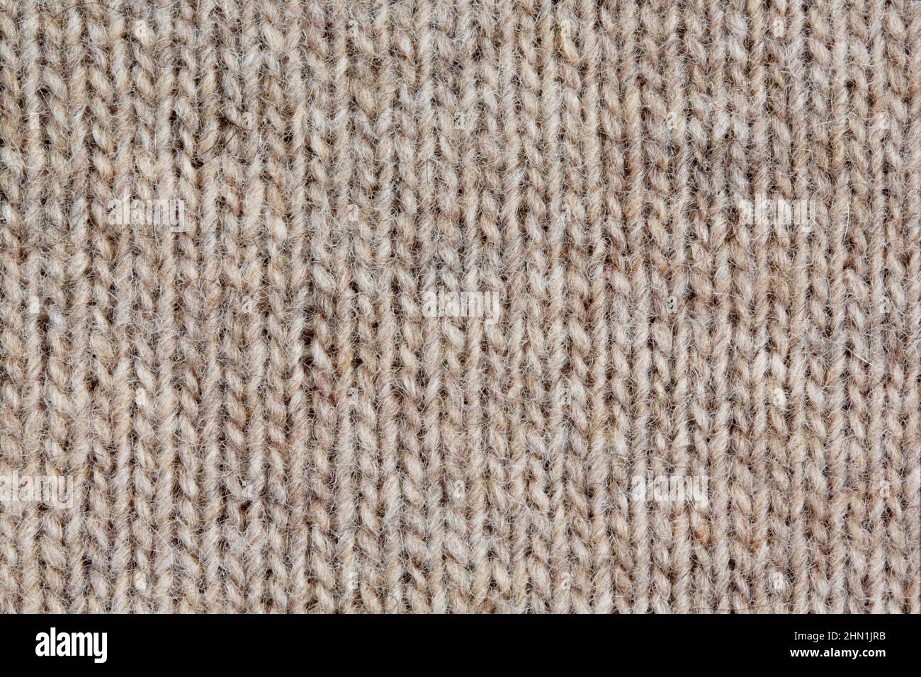 Strickpullover, Nahaufnahme neutral im Hintergrund Stockfoto