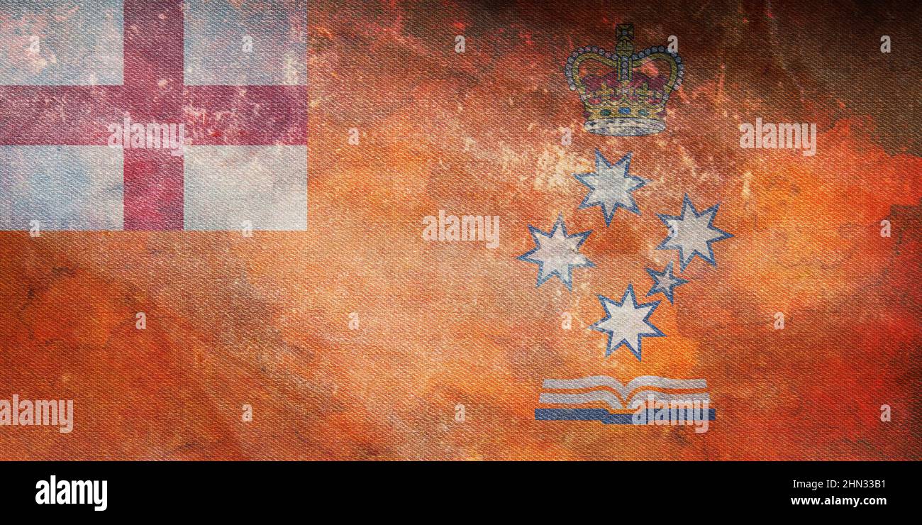 Draufsicht auf die loyale Orange Institution of Victoria, Australien Retro-Flagge mit Grunge-Struktur. Australisches Reise- und Patriot-Konzept. Kein Fahnenmast. Ebene Stockfoto