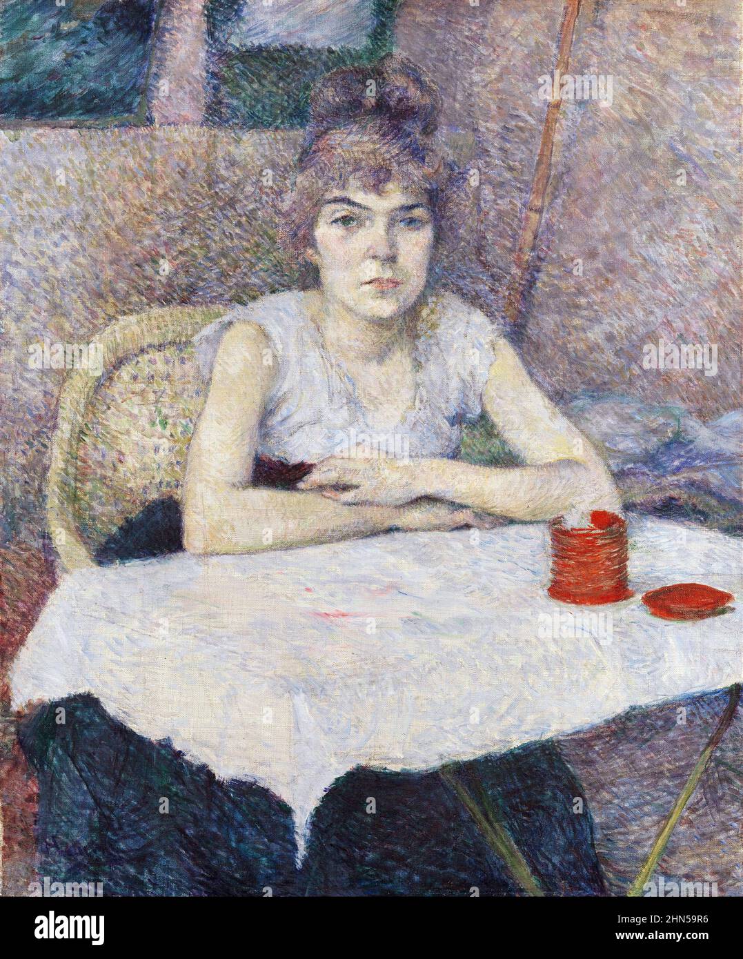 Junge Frau an einem Tisch, Poudre de riz - Antike Vintage-Kunst von Henri Toulouse-Lautrec. Stockfoto