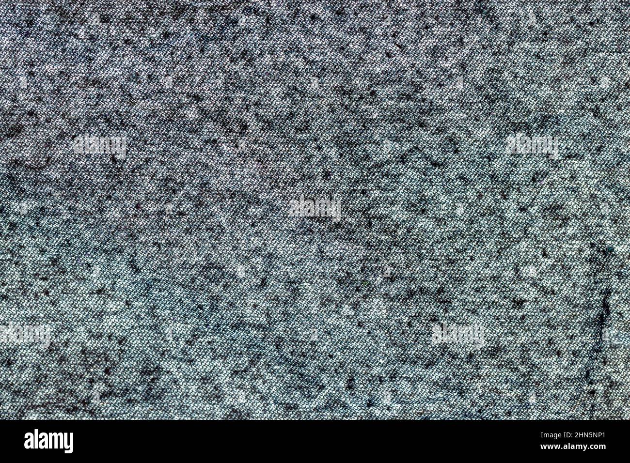 Struktur aus dunklem Stoff, Nahaufnahme aus Leinwand. Abstrakte Struktur der grauen Farbe Stockfoto