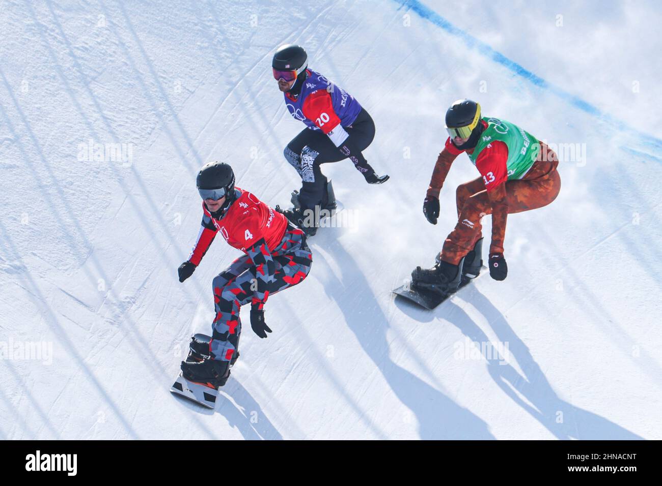 (L-R) Alessandro Haemmerle (AUT), Mick Dierdorff (USA), Liam Moffatt (CAN), 10. FEBRUAR 2022 - Snowboard : Men's Snowboard Cross 1/8 Finale während Stockfoto