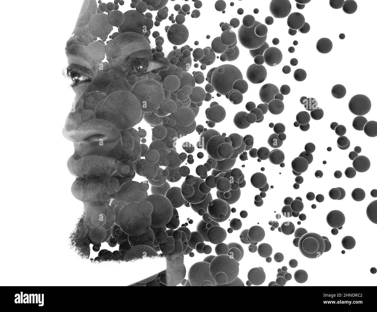 Ein Porträt eines afroamerikanischen Mannes kombiniert mit schwebenden 3D Sphären. Stockfoto