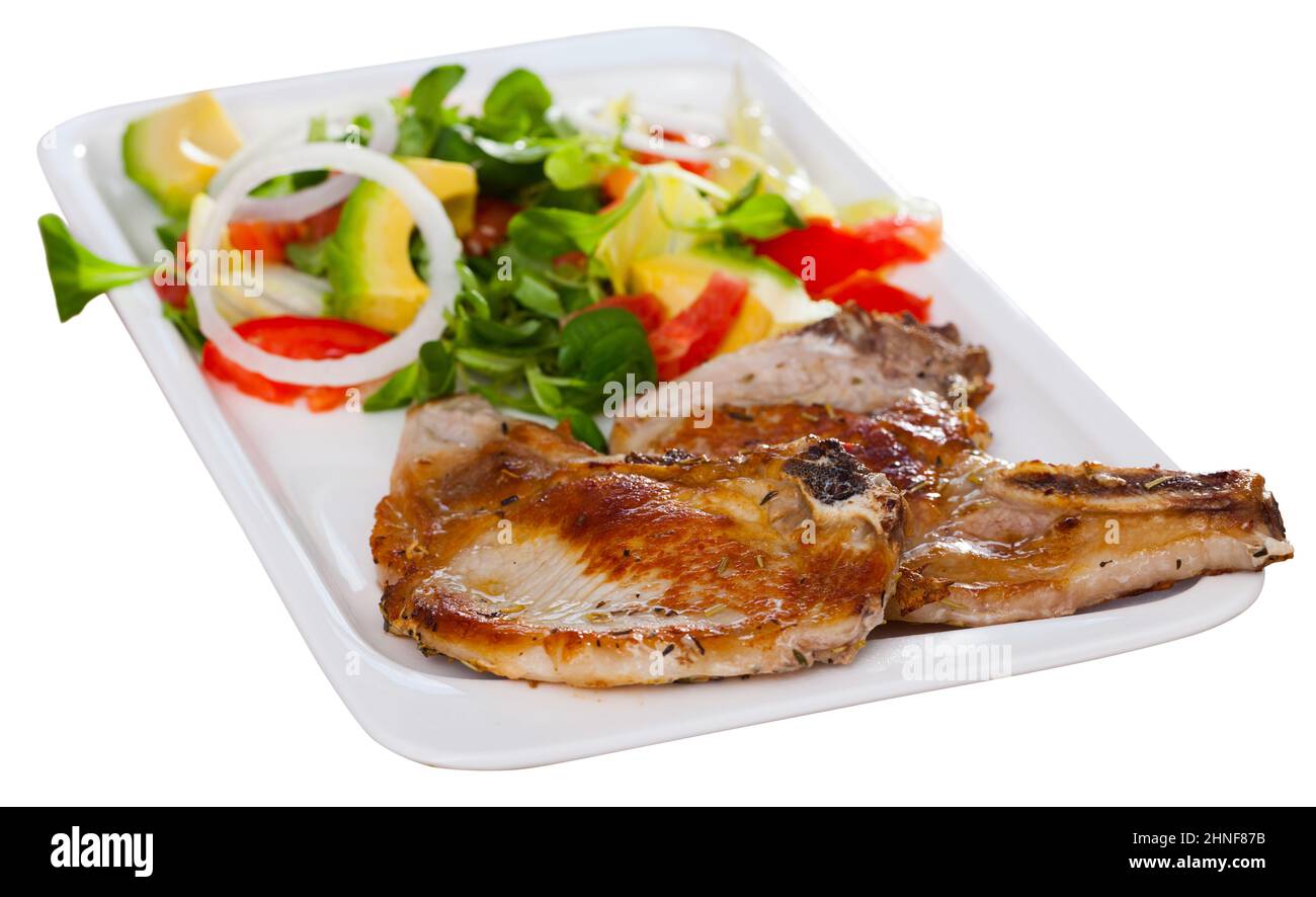 Gebratener Schweinelende mit Salat Stockfoto