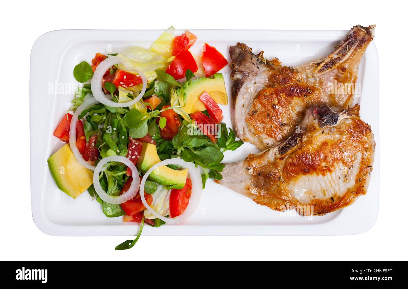 Gebratener Schweinelende mit Salat Stockfoto