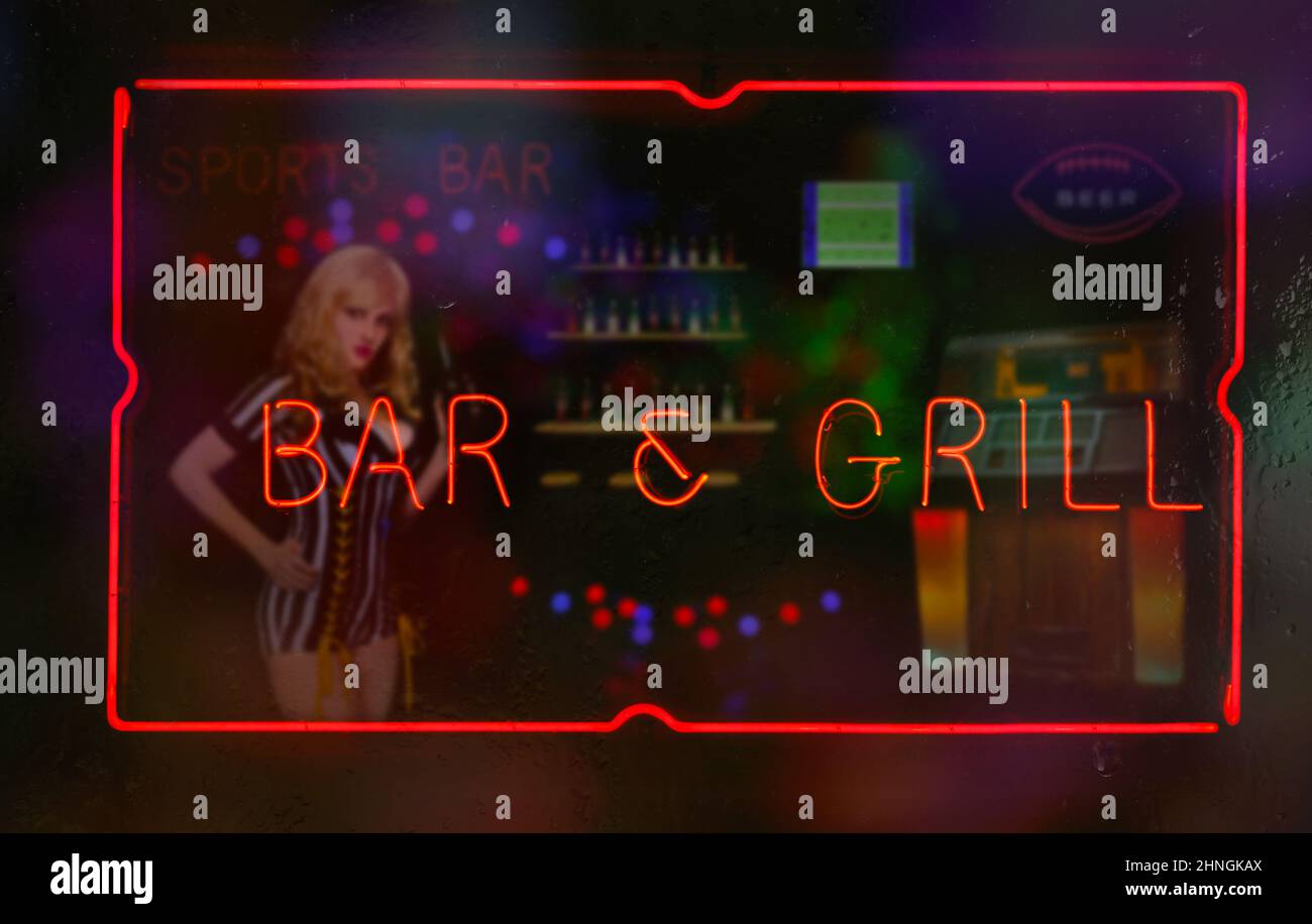 Neon Bar und Grill Schild in Rainy Window Sports Bar Thema Stockfoto