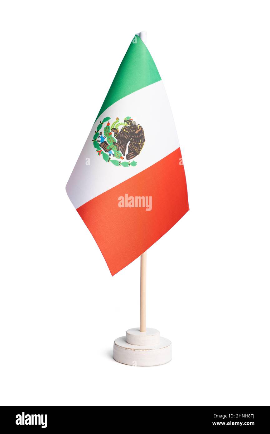 Kleine Tischflagge von Mexiko isoliert auf weißem Hintergrund Stockfoto