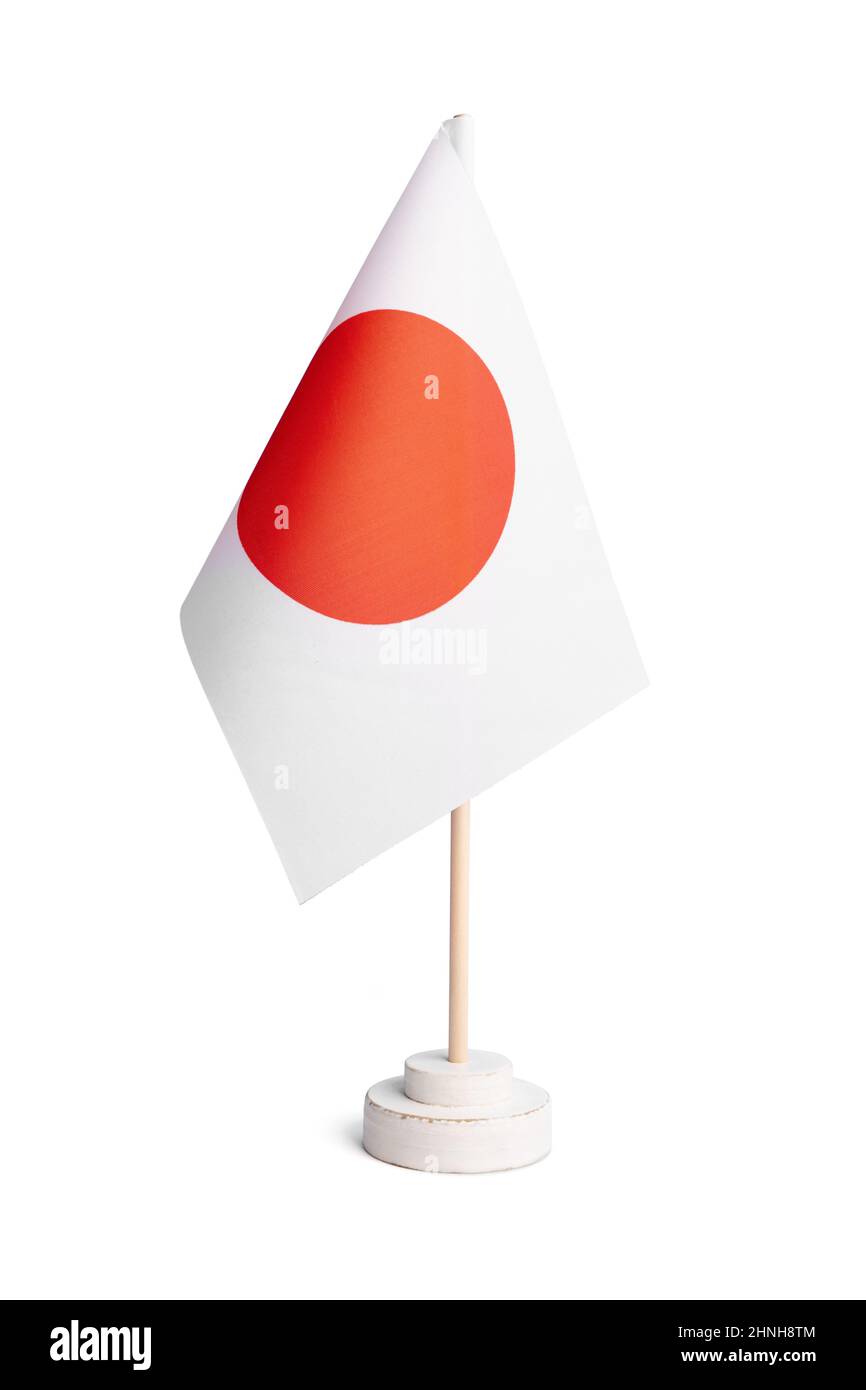 Kleine Tischflagge von Japan isoliert auf weißem Hintergrund Stockfoto