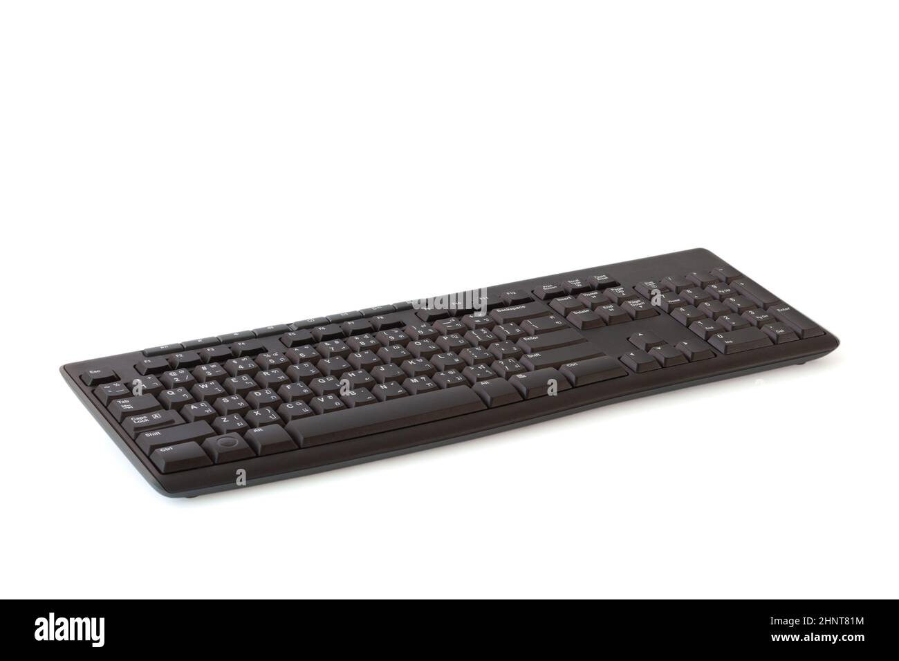 Schwarze kabellose Tastatur mit thailändischem und englischem Layout Stockfoto