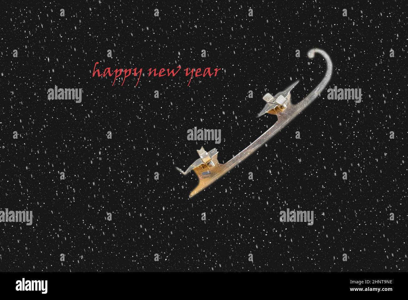 Vintage ice-auf schwarzem Hintergrund mit Schnee Effekt Skate. Text - Frohes neues Jahr. Platz kopieren Stockfoto