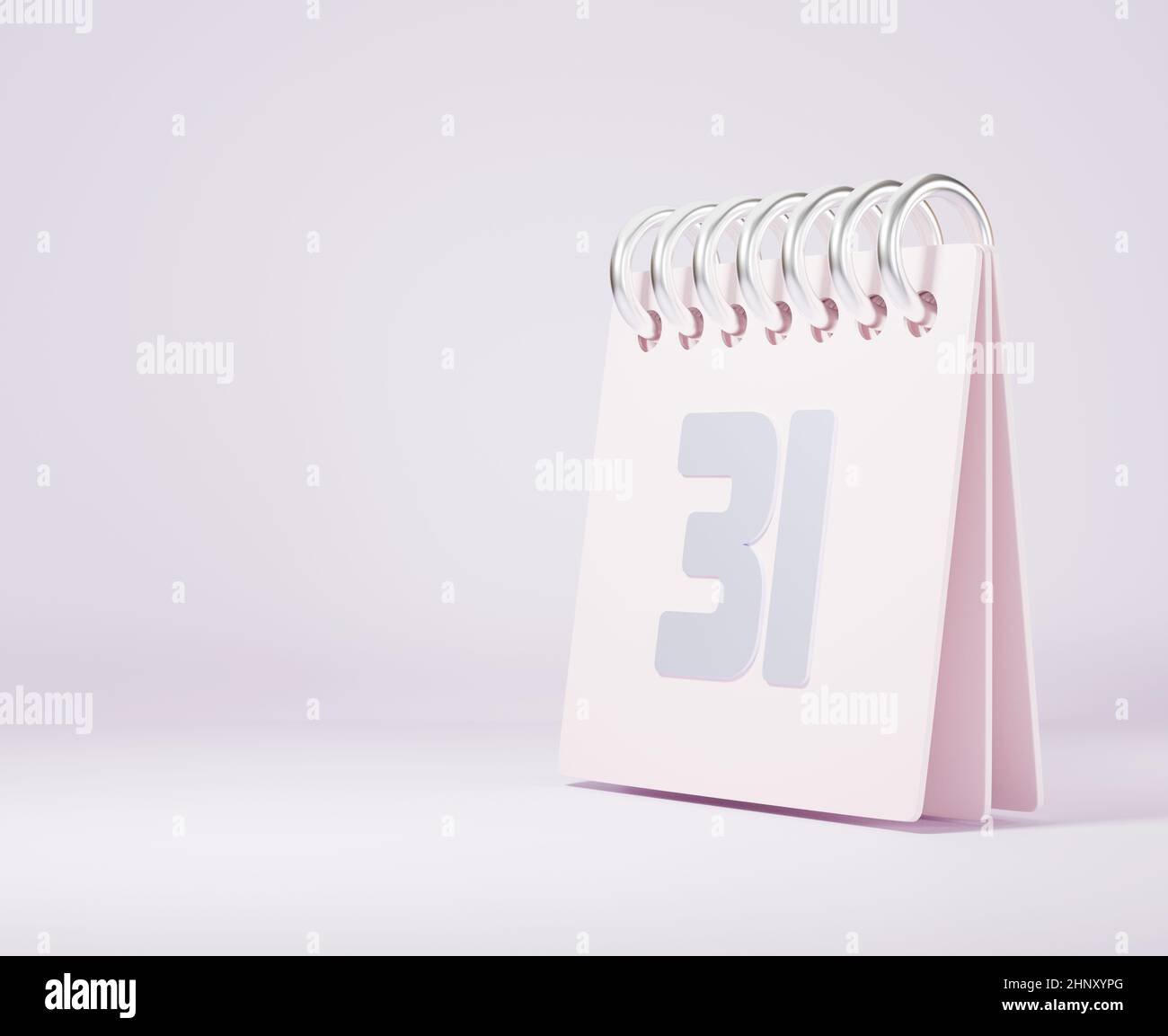 Desktop-Kalender gegen mit dem letzten Tag Jahr Nummer 31, Rosa stehenden Monat gefüttert Frühling Schreibtisch Kalender und Datum auf rosa Hintergrund, Design-Element für Stockfoto