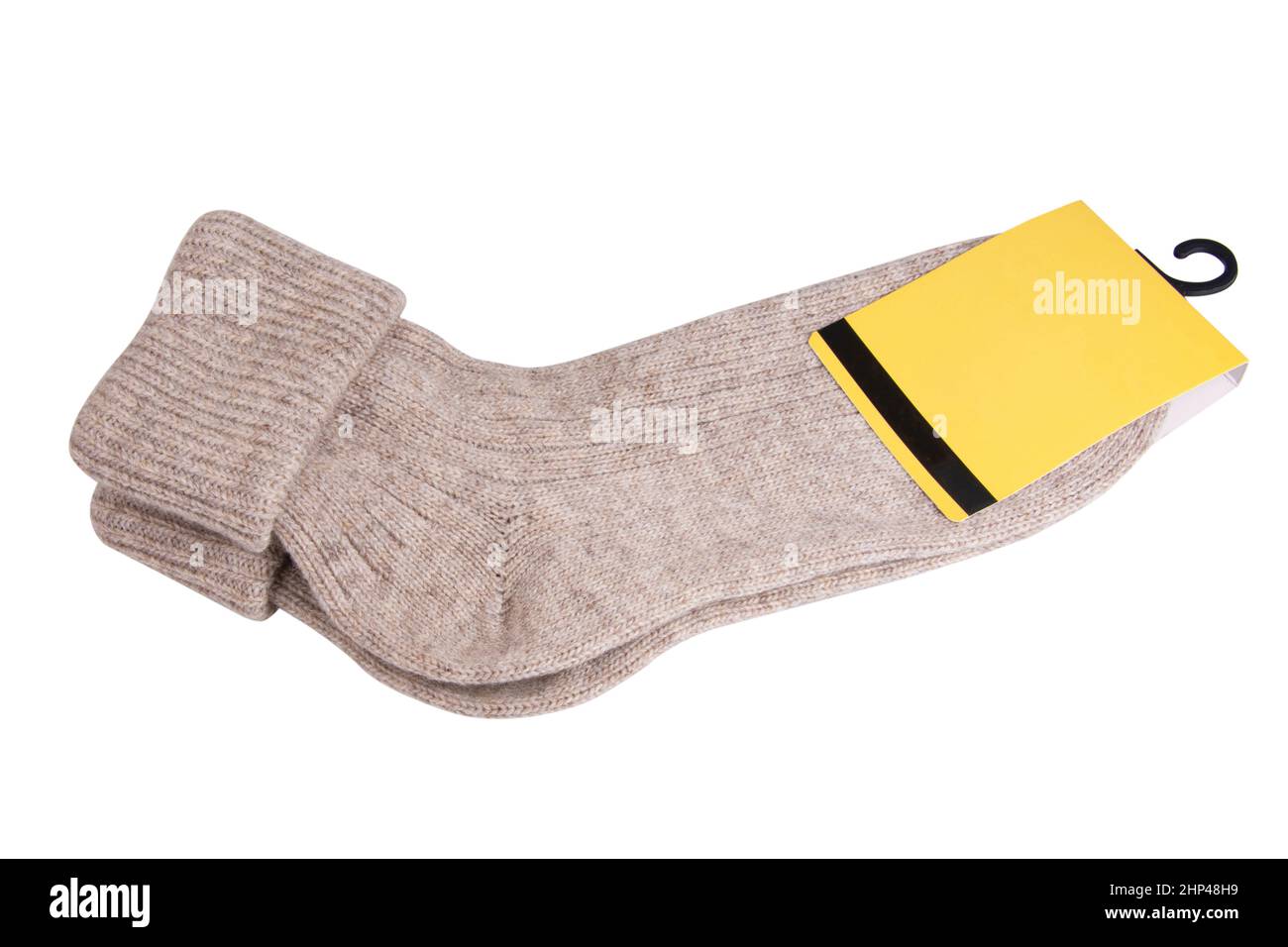 Beige warme Wintersocken elegant isoliert auf weißem Hintergrund Stockfoto