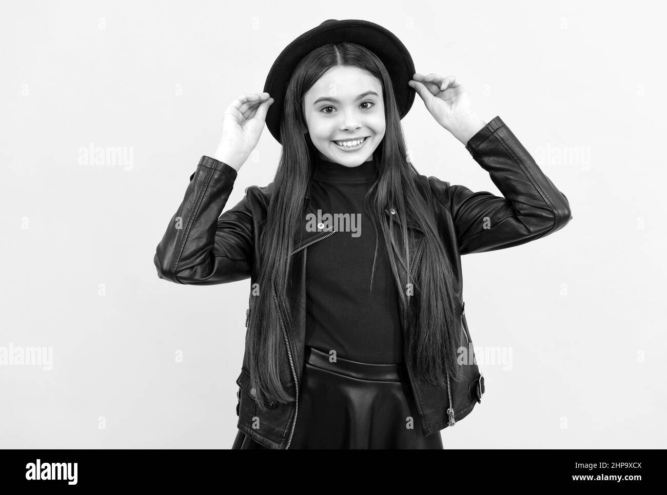 Happy teen Mädchen in Hut und Lederjacke, Hipster Stockfoto