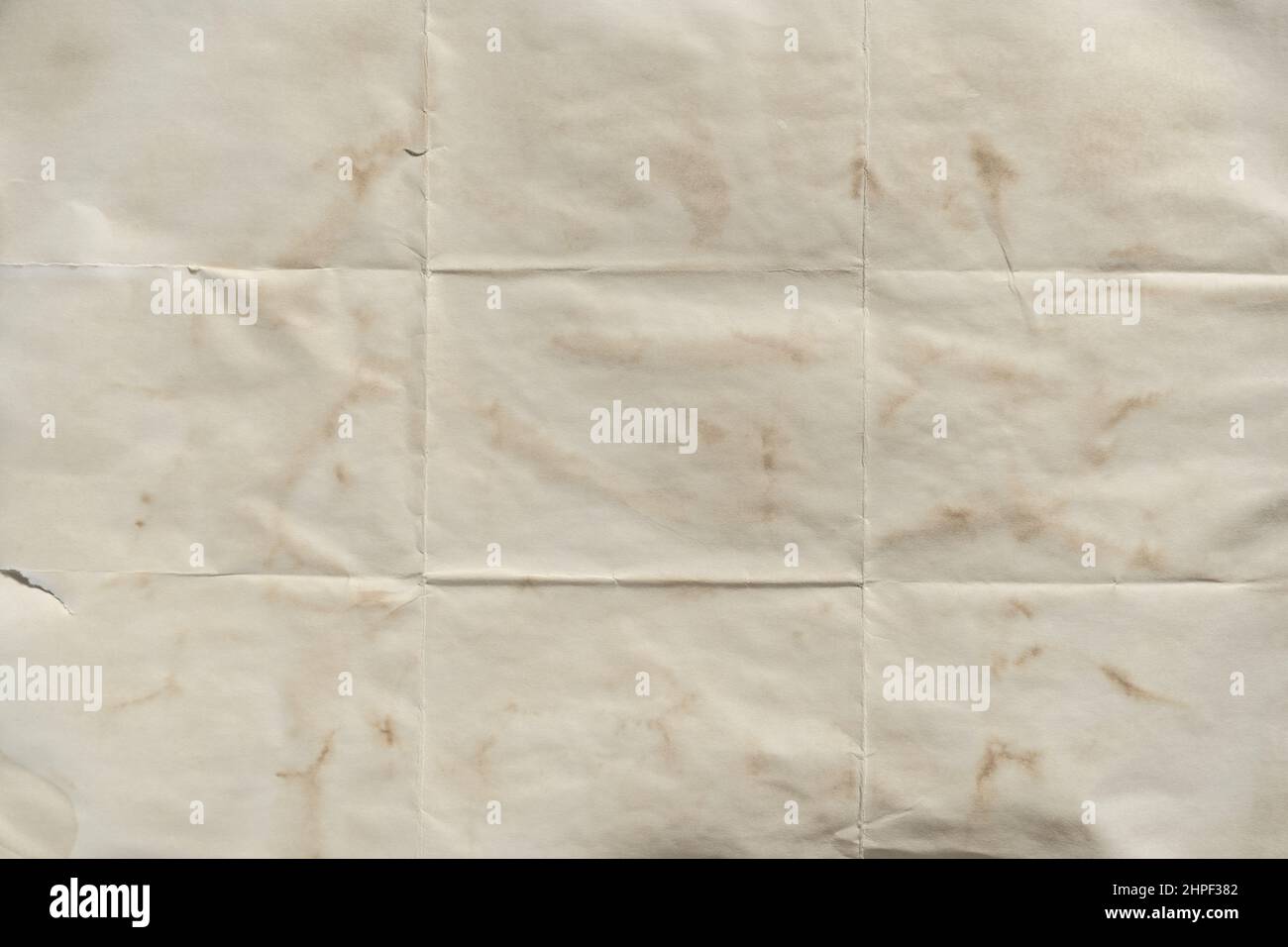 Alte gefaltete gelbe Papier Textur Hintergrund Stockfoto