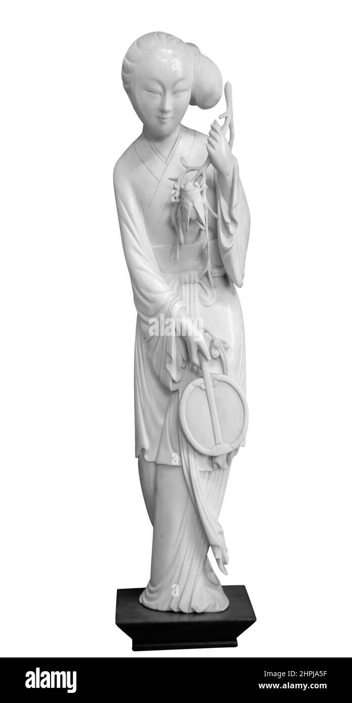 Geisha Figur in Nationalkleid, Kimono traditionelle Haare, Fan in der Hand. Souvenir-Puppe, isoliert auf weißem Hintergrund mit Clipping-Pfad Stockfoto Geisha Figur in Nationalkleid, Kimono traditionelle Haare, Fan in der Hand. Souvenir-Puppe, isoliert auf weißem Hintergrund mit Clipping-Pfad Stockfoto