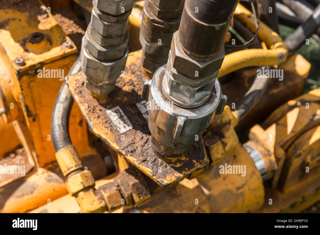 Hydraulikdruckschlauch, Zylinder, Systemanschluss, Schlauch, Pumpenausrüstung Anschließen. Stockfoto