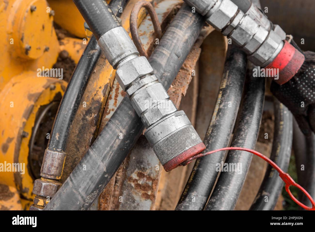 Hydraulikdruckschlauch, Zylinder, Systemanschluss, Schlauch, Pumpenausrüstung Anschließen. Stockfoto