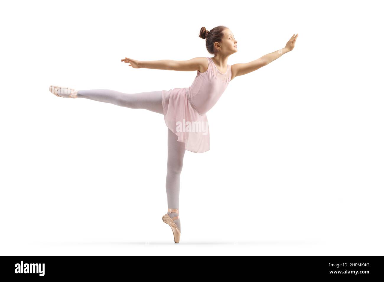 Kleine Ballerina in rosa Kleid tanzen isoliert auf weißem Hintergrund Stockfoto