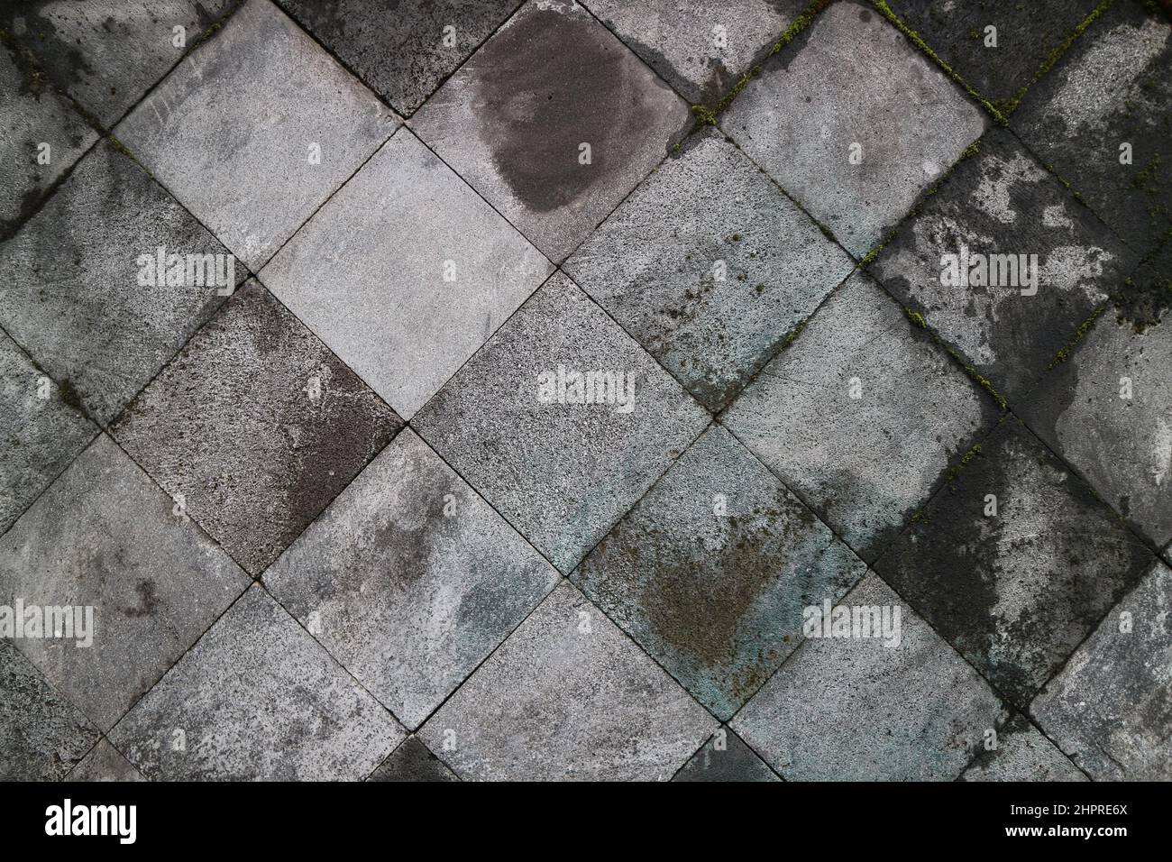 Abstrakte traditionelle Steinwand Pflaster Textur Hintergrund. Holprige, strukturierte Steinmauer aus Steinplatten und Slabstone. Stockfoto