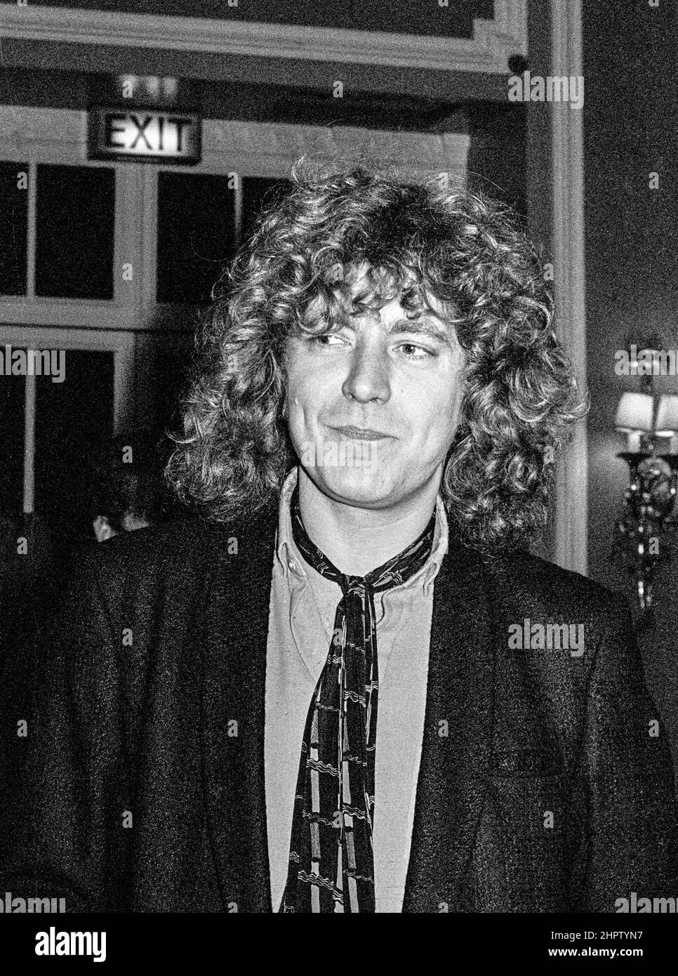 Der englische Sänger Robert Plant, CBE bei einer Melody Maker Poll Awards Zeremonie in London im Jahr 1979. Stockfoto