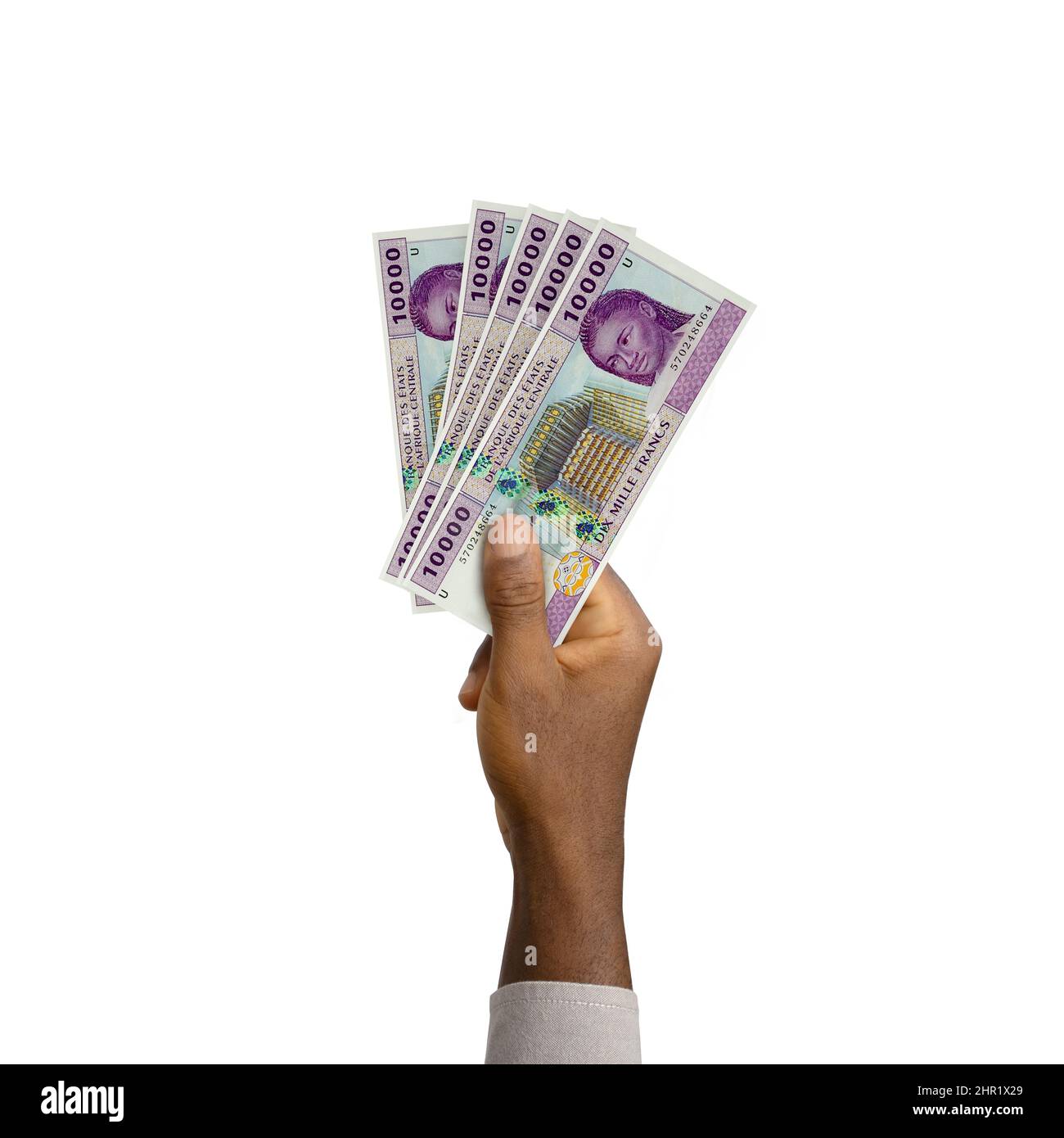 Schwarze Hand mit 3D gerendert 10000 zentralafrikanische CFA-Franc-Noten Stockfoto