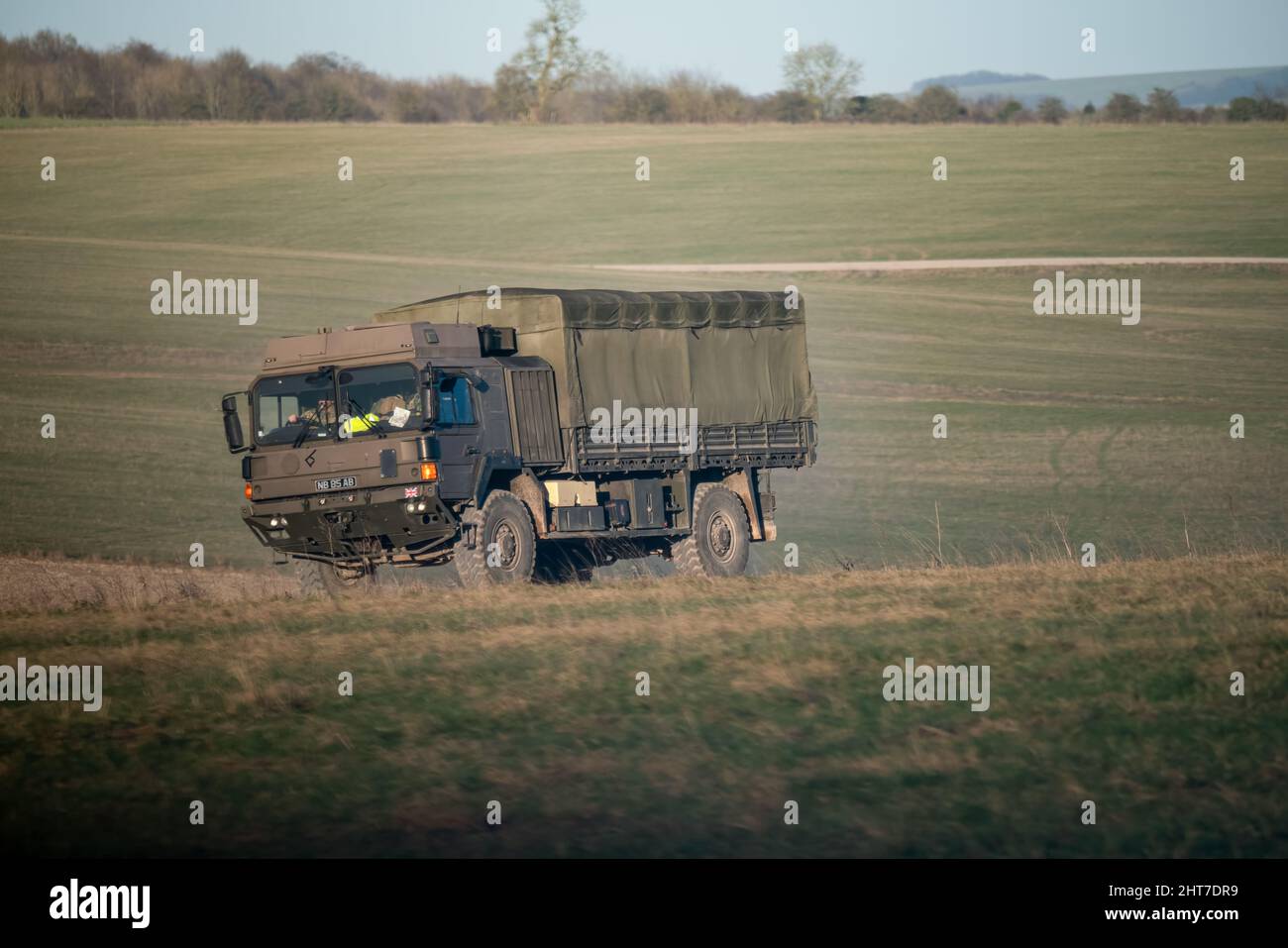 British Army MAN SV 4x4 Utility Trucks 4x4 Fahrzeuge in Aktion auf einer militärischen Kampftraining Übung, Wiltshire UK Stockfoto