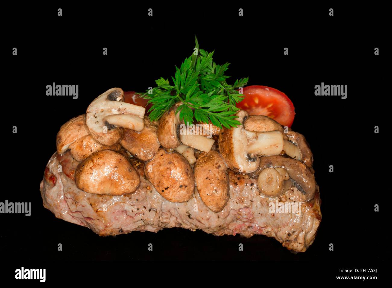 Steak mit Pilzen Stockfoto