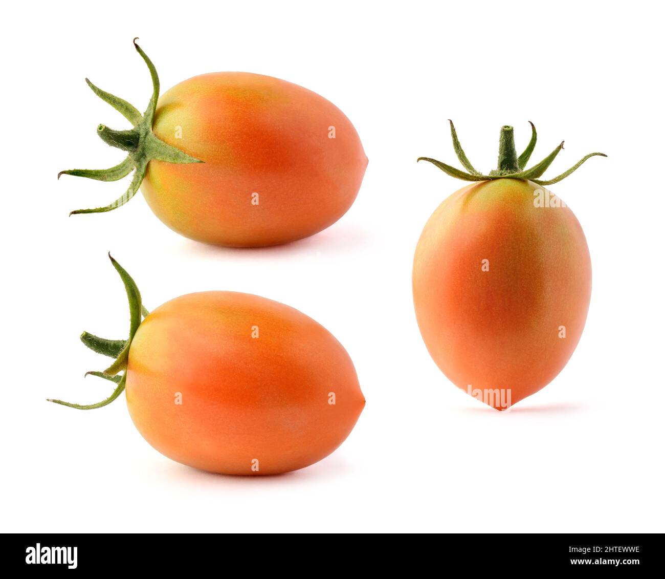 Tomaten, essbare Beeren in verschiedenen Winkeln, isoliert auf weißem Hintergrund, Nahaufnahmemakro, Sammlung Stockfoto