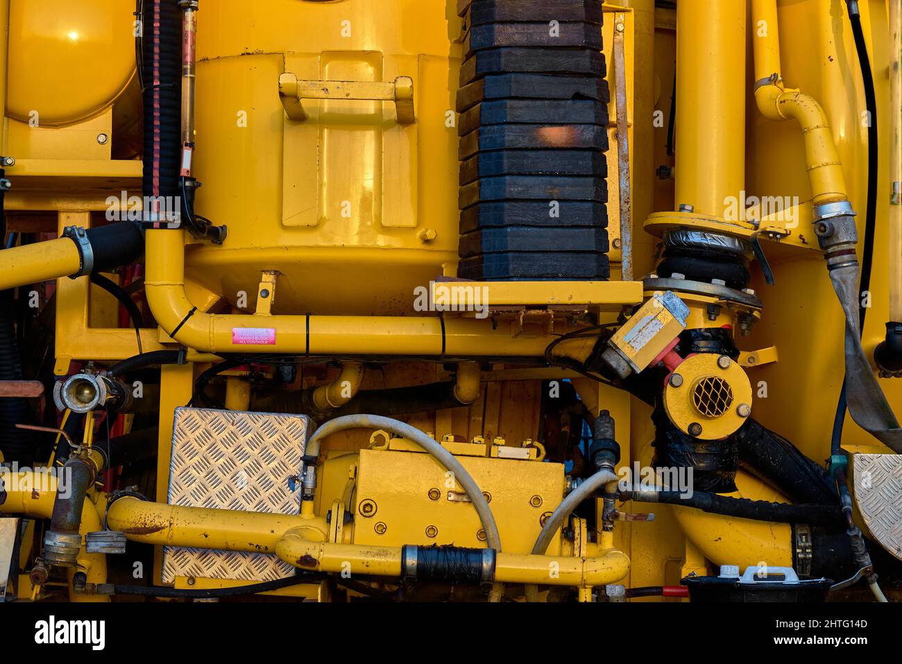 Abstrakt von gelben und schwarzen Industriemaschinen Stockfoto