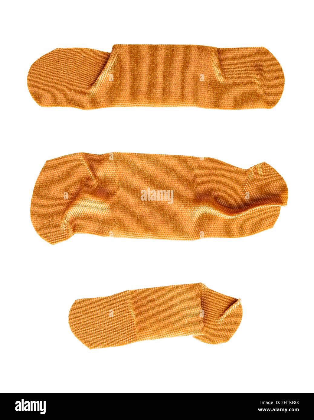 Drei gebrauchte faltige und verbogene Bandagen werden ausgeschnitten. Stockfoto