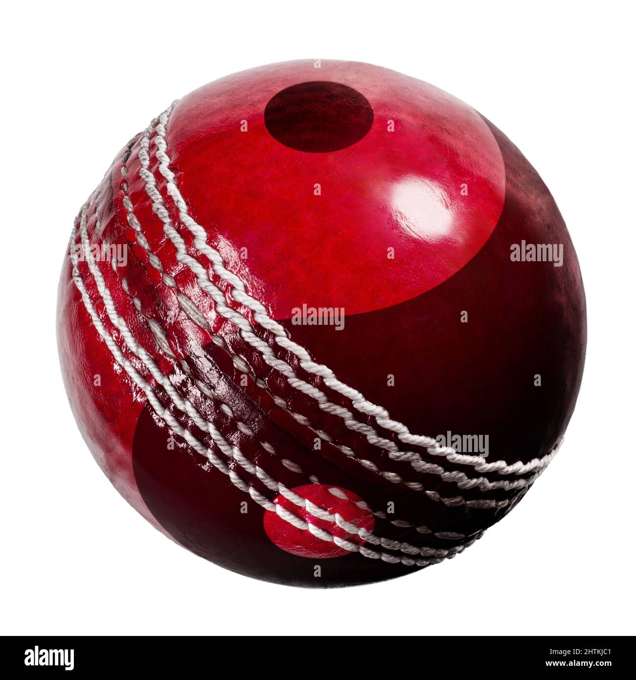yin und Yang rote Cricket-Kugel isoliert auf weißem Hintergrund Stockfoto