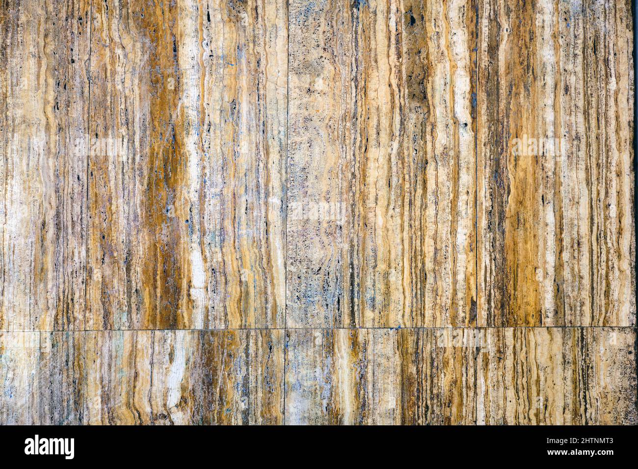 Hintergrund von einer Wand aus braunen Marmorplatten Stockfoto
