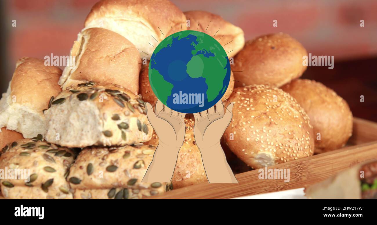 Bild des Planeten Erde und übergibt frische Bio-Sandwiches und Brötchen Stockfoto