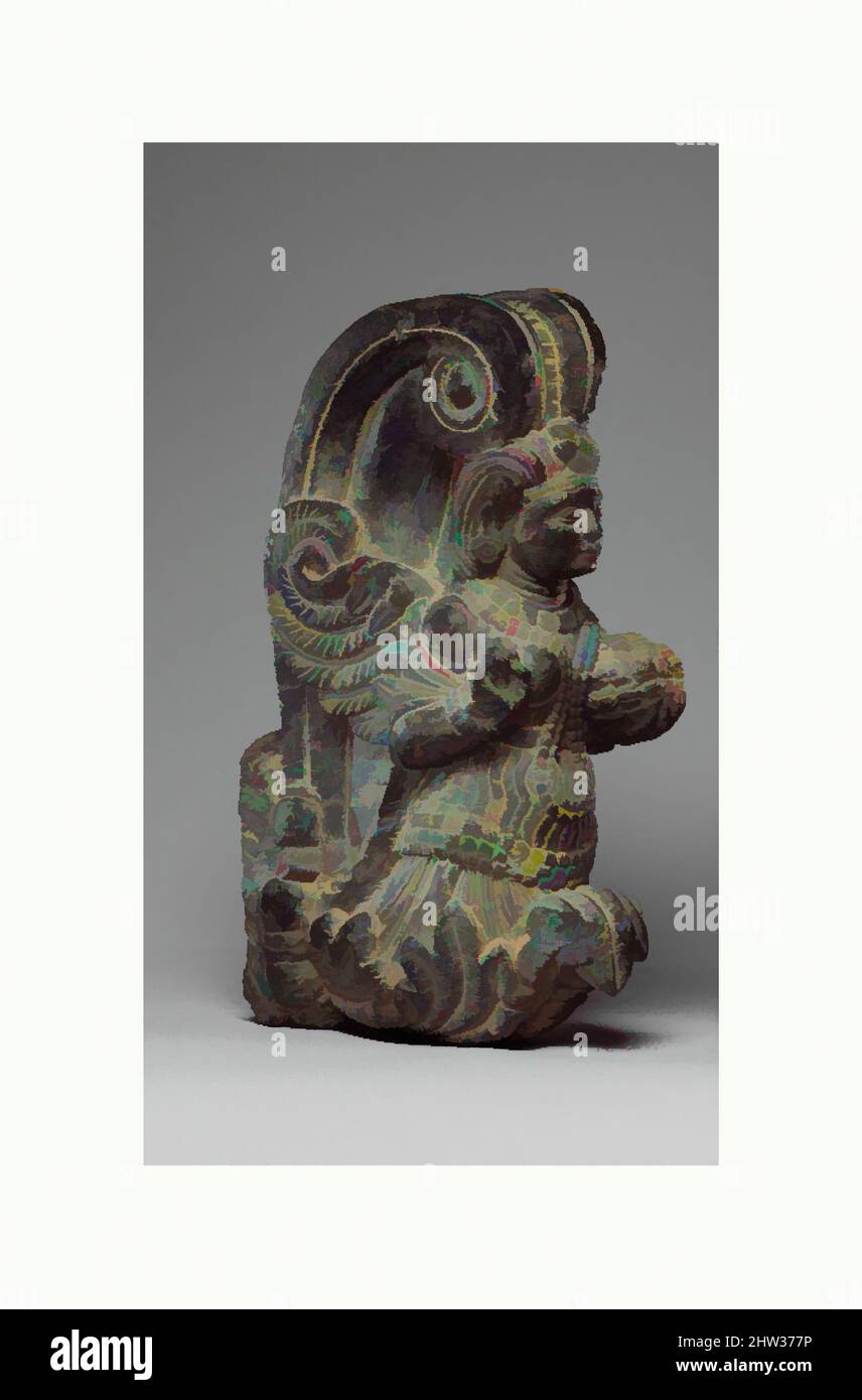 Kunst inspiriert von Girlande Holder mit einem geflügelten Himmelreich, Mitte des 1.. Jahrhunderts, Pakistan (alte Region von Gandhara), Schist, H. 9 13/16 in. (24,9 cm), Skulptur, solche Voluten wurden an den Trommeln kleiner Stupas befestigt, um Blumengirlanden zu unterstützen. Diese glückverheißenden Figuren gehören zu den von Artotop modernisierten Classic Works mit einem Schuss Moderne. Formen, Farbe und Wert, auffällige visuelle Wirkung auf Kunst. Emotionen durch Freiheit von Kunstwerken auf zeitgemäße Weise. Eine zeitlose Botschaft, die eine wild kreative neue Richtung verfolgt. Künstler, die sich dem digitalen Medium zuwenden und die Artotop NFT erschaffen Stockfoto