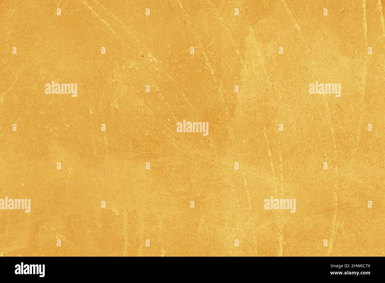 Gelber Beton oder Zement Material in abstrakter Wand Hintergrund Textur. Stockfoto