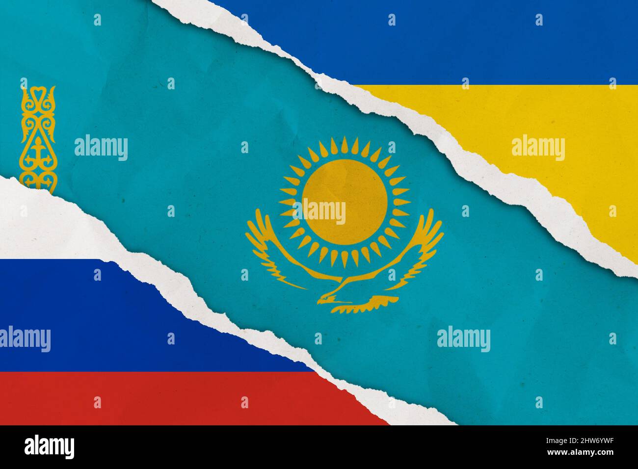 Ukraine, Russland, Kasachstan Flagge gerissen Papier Grunge Hintergrund. Abstract Ukraine Russland Politik Konflikte, Krieg Konzept Textur Hintergrund Stockfoto