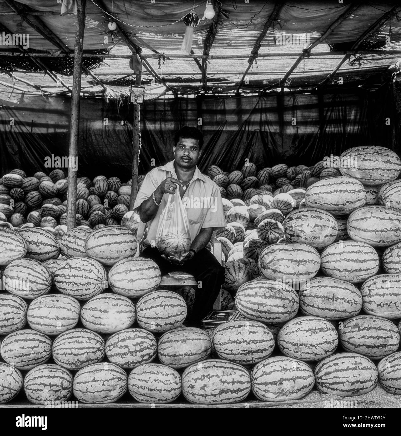 Wassermelone Verkäufer und produzieren in Goan Markt, Indien Stockfoto