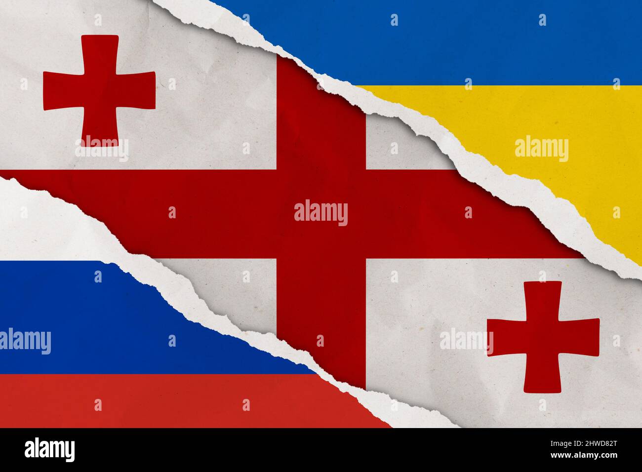 Ukraine, Russland, Georgien Flagge gerissen Papier Grunge Hintergrund. Abstract Ukraine Russland Politik Konflikte, Krieg Konzept Textur Hintergrund. Stockfoto