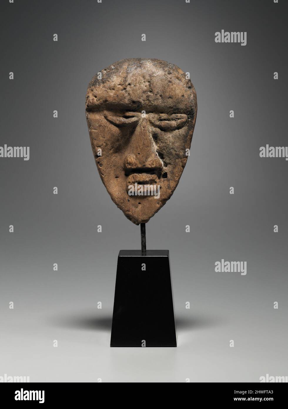 Zweiseitige Miniaturmaske Stockfoto