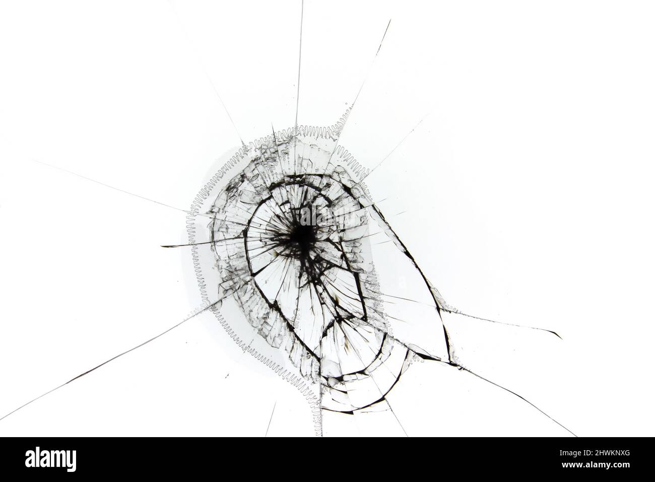 Risse auf gebrochenem Glas, Textur auf Weiß. Stockfoto