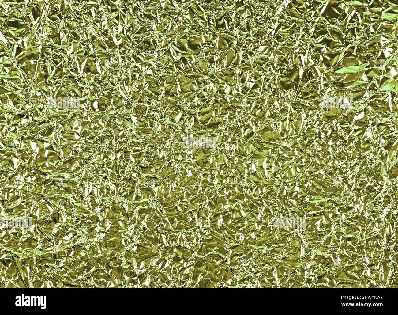 Zerknitterte goldene Aluminiumfolie als Hintergrund Stockfoto